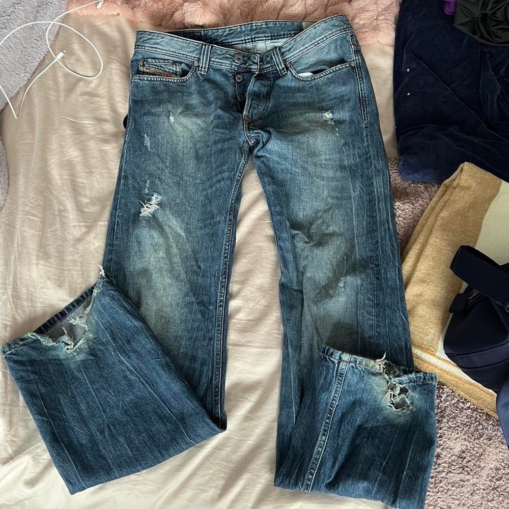 low waisted light wash ripped diesel denim jeans